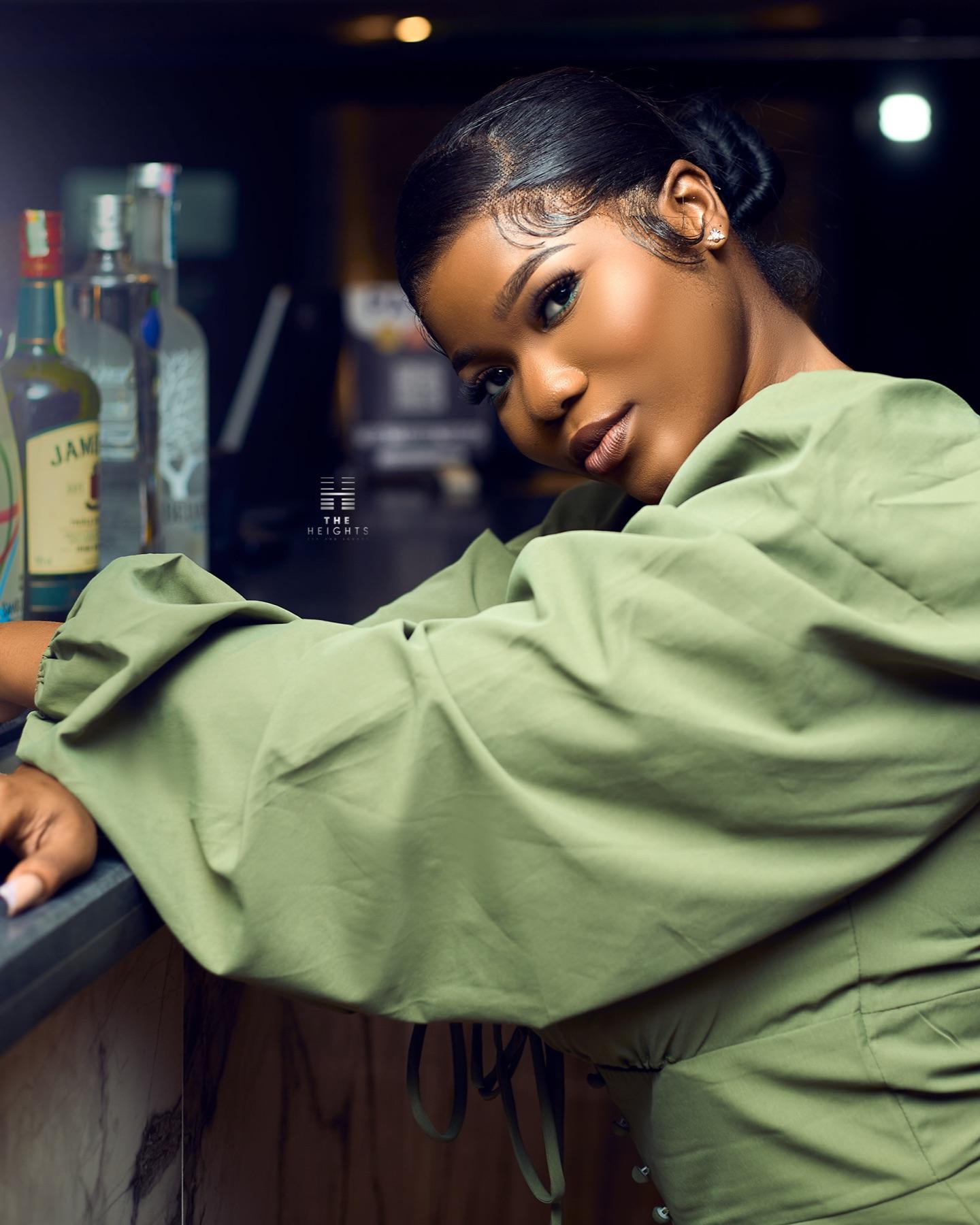 A guest at the bar at The Heights Bar & Lounge, Kumasi